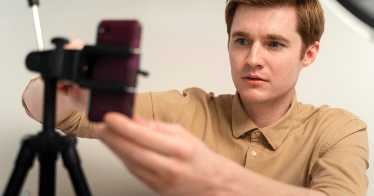 video-creator-adjusting-camera