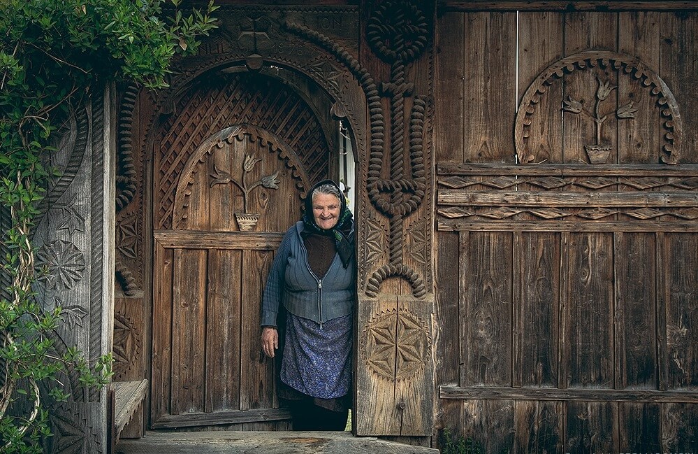 Carved wooden gate in maramures region village